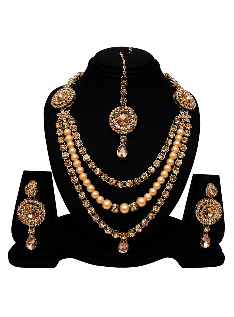 Golden Alloy Austrian Diamond Set With Earrings and Maang Tikka 128603