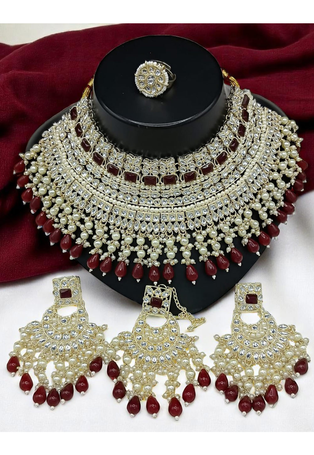 Maroon Alloy Necklace Set With Earrings and Maang Tikka 328424