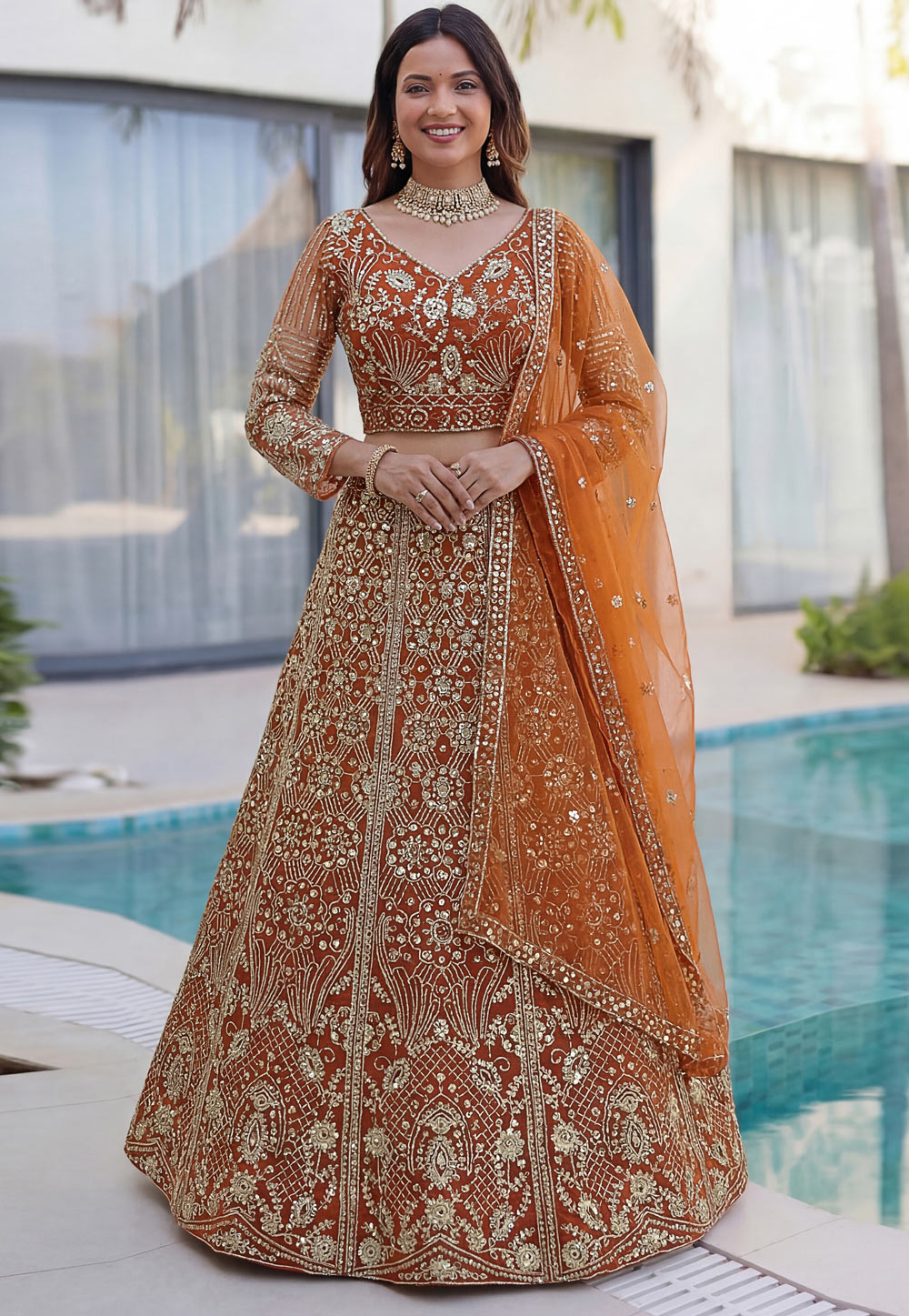 Orange Net Lehenga Choli 326500