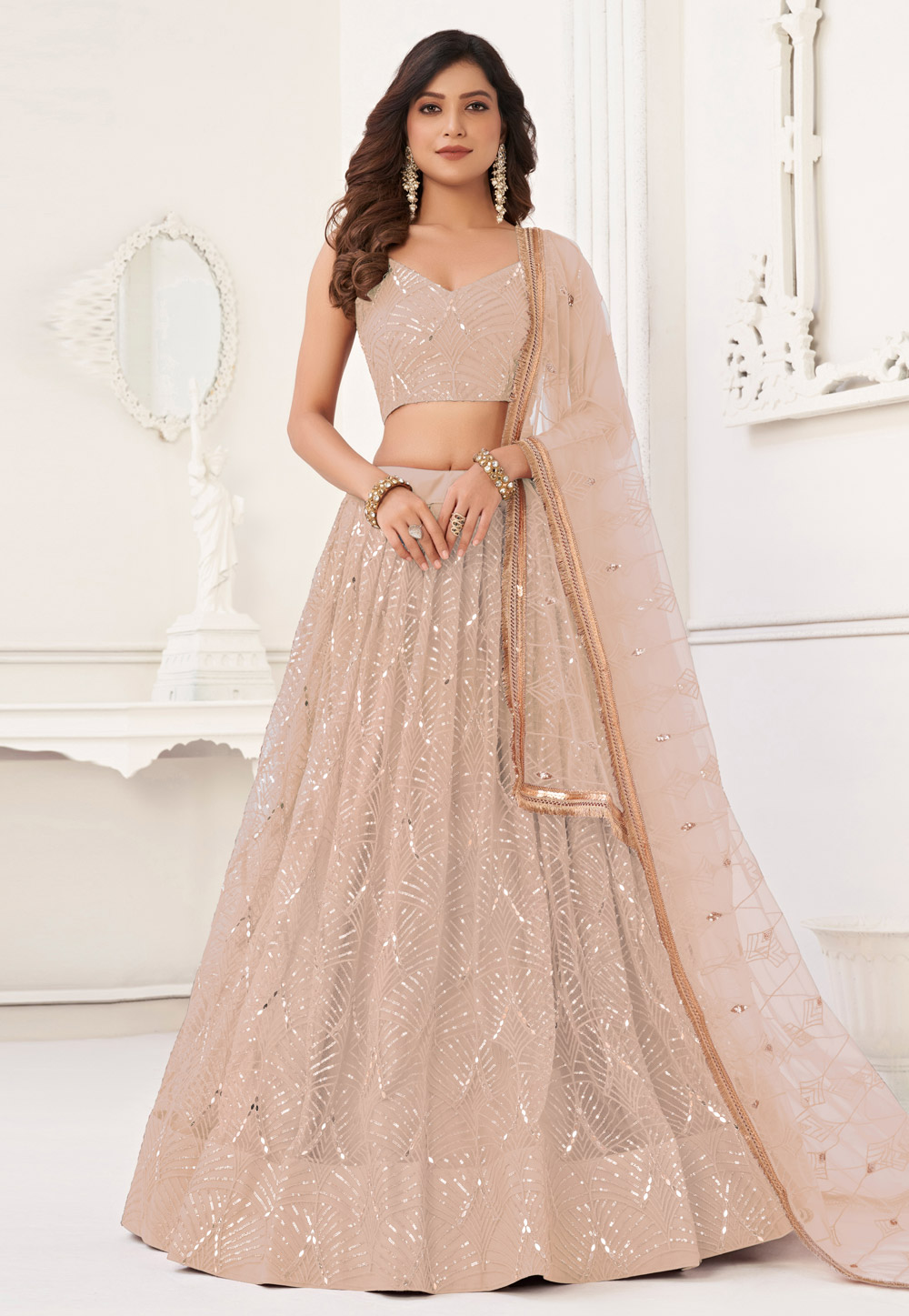 Peach Net Lehenga Choli 323352