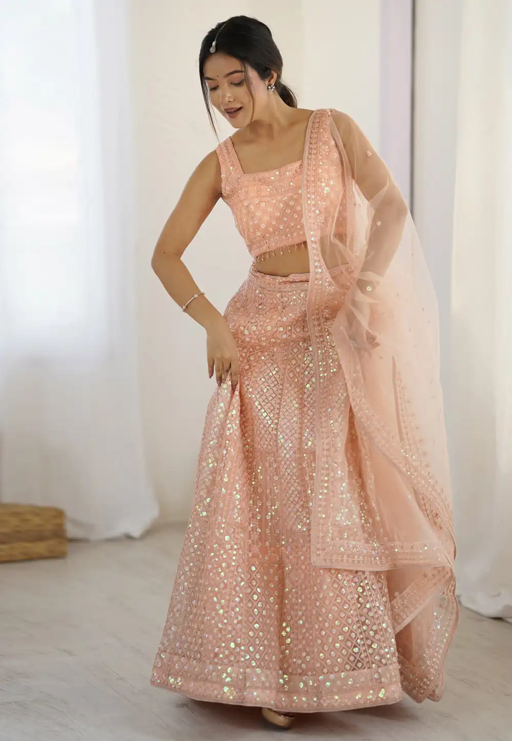 Peach Net Lehenga Choli 314958