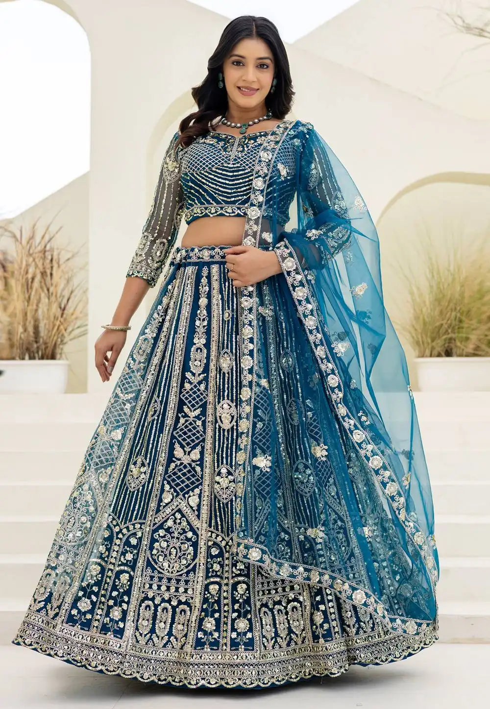 Teal Net Lehenga Choli 323000