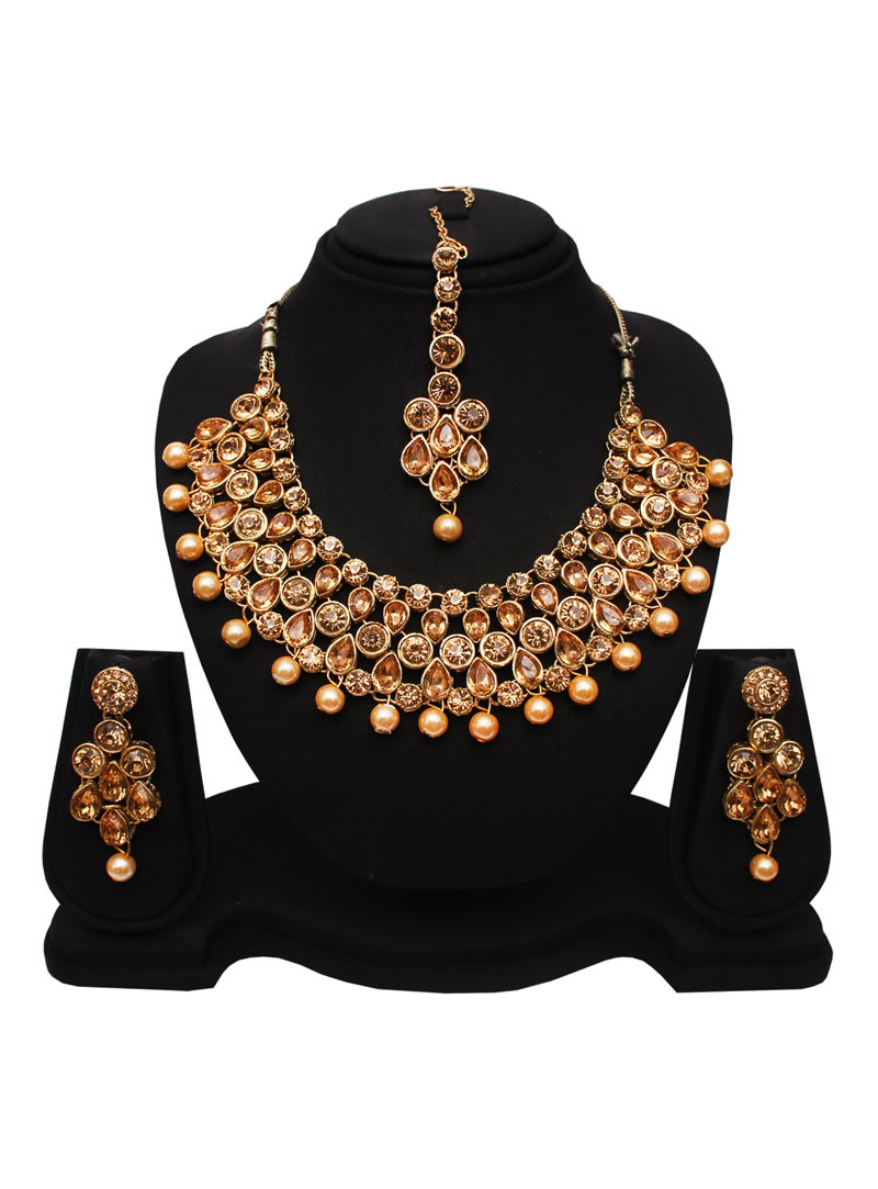 Golden Alloy Austrian Diamonds Necklace With Earrings and Maang Tikka 89175