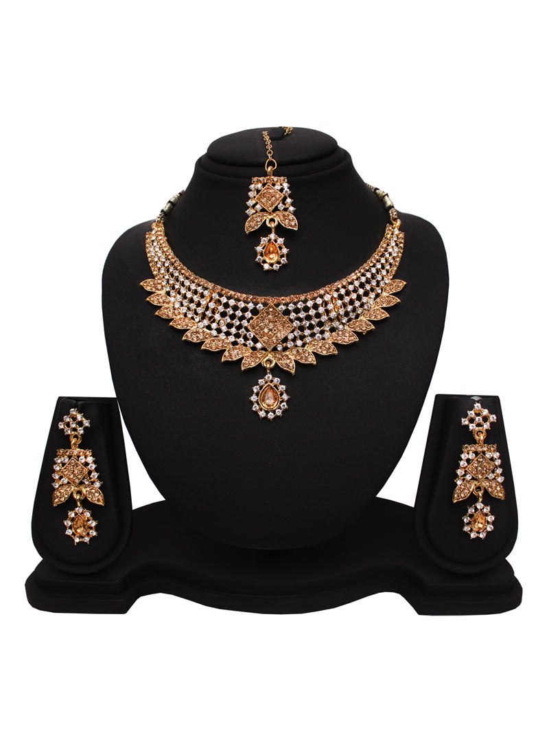 Golden Alloy Austrian Diamonds Necklace With Earrings and Maang Tikka 89185