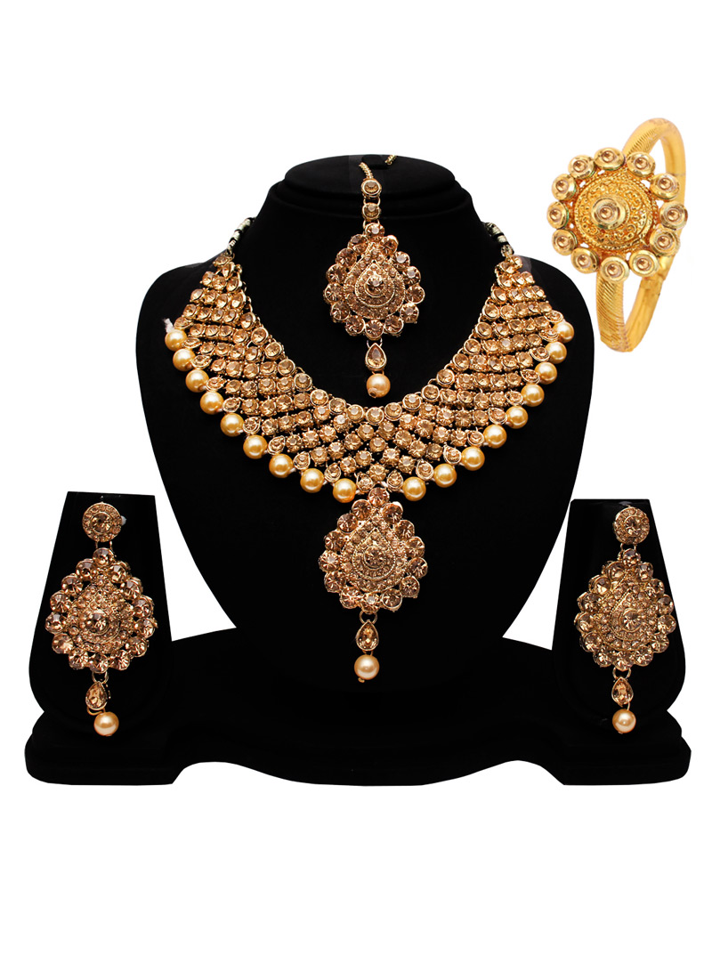 Golden Alloy Austrian Diamond Set With Earrings and Maang Tikka 128544