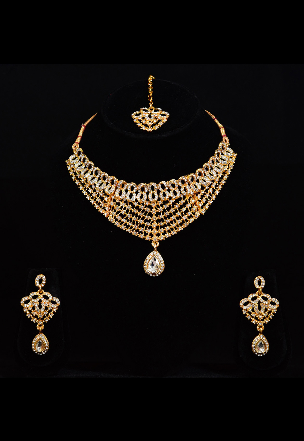Golden Alloy Austrian Diamond Necklace Set With Earrings and Maang Tikka 247900