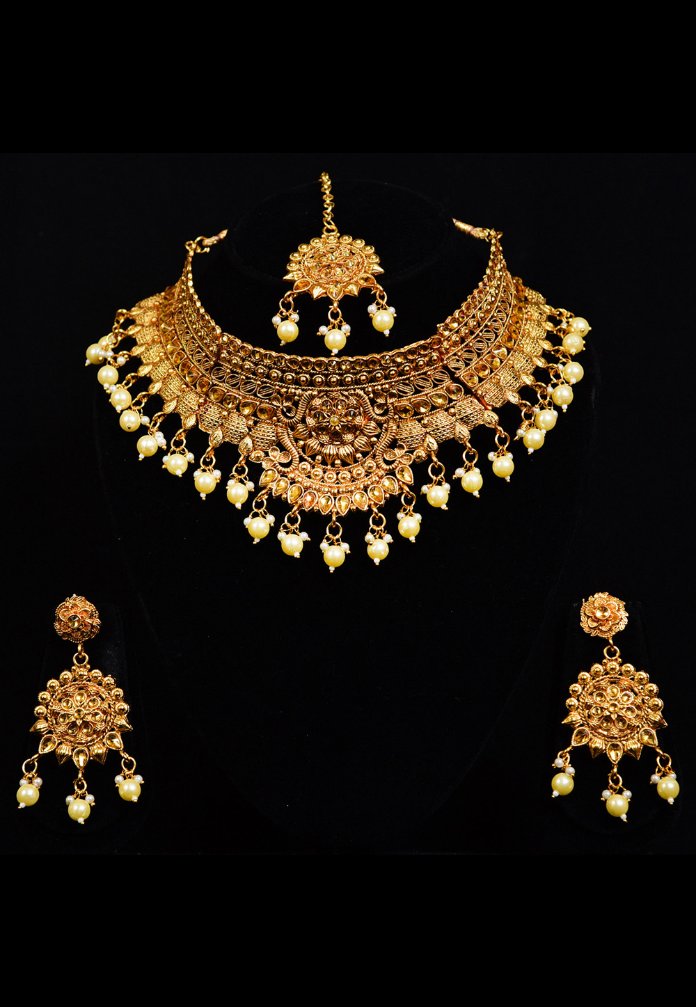 Golden Alloy Austrian Diamond Necklace Set With Earrings and Maang Tikka 247909