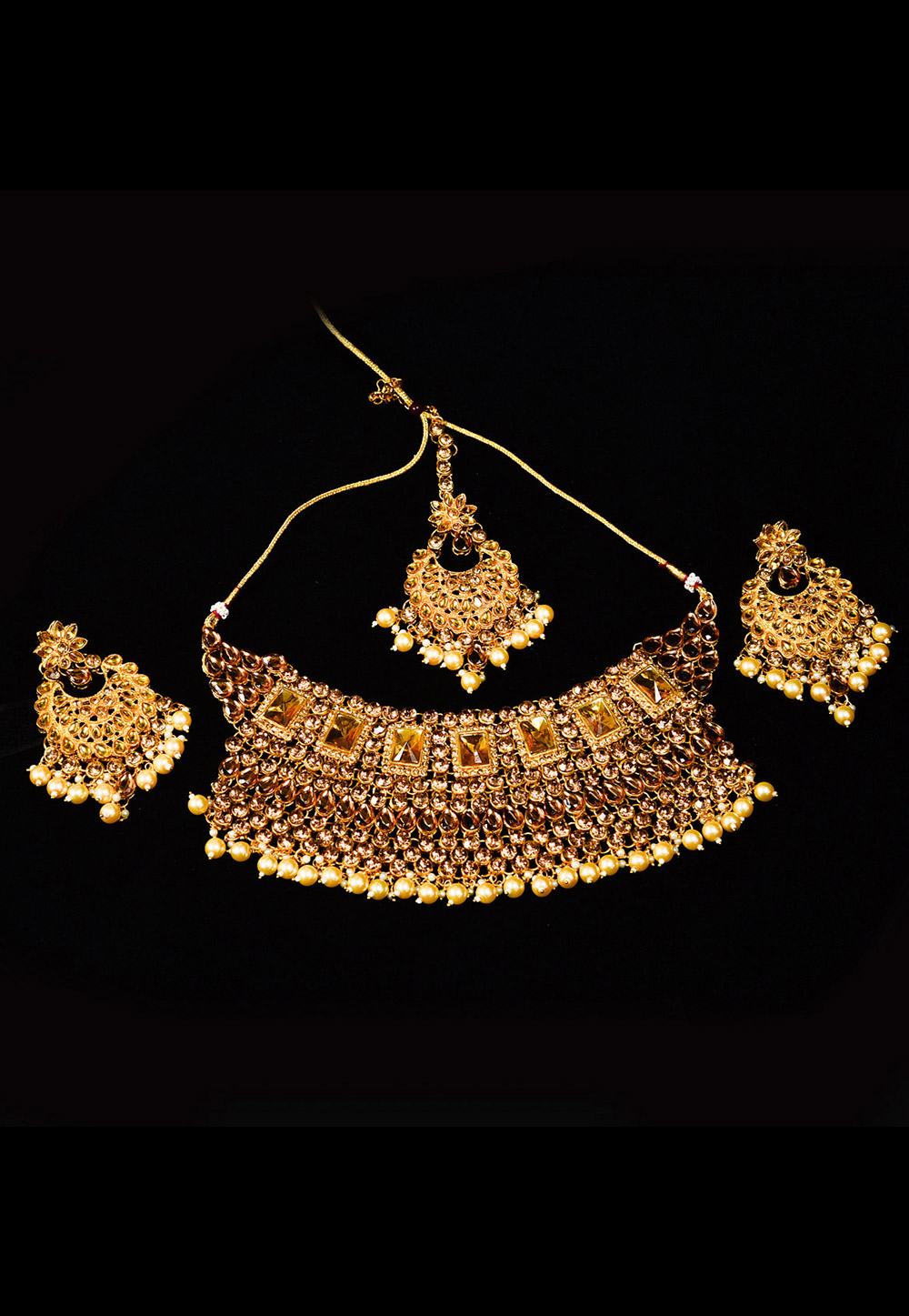 Golden Alloy Austrian Diamond Necklace Set With Earrings and Maang Tikka 247927