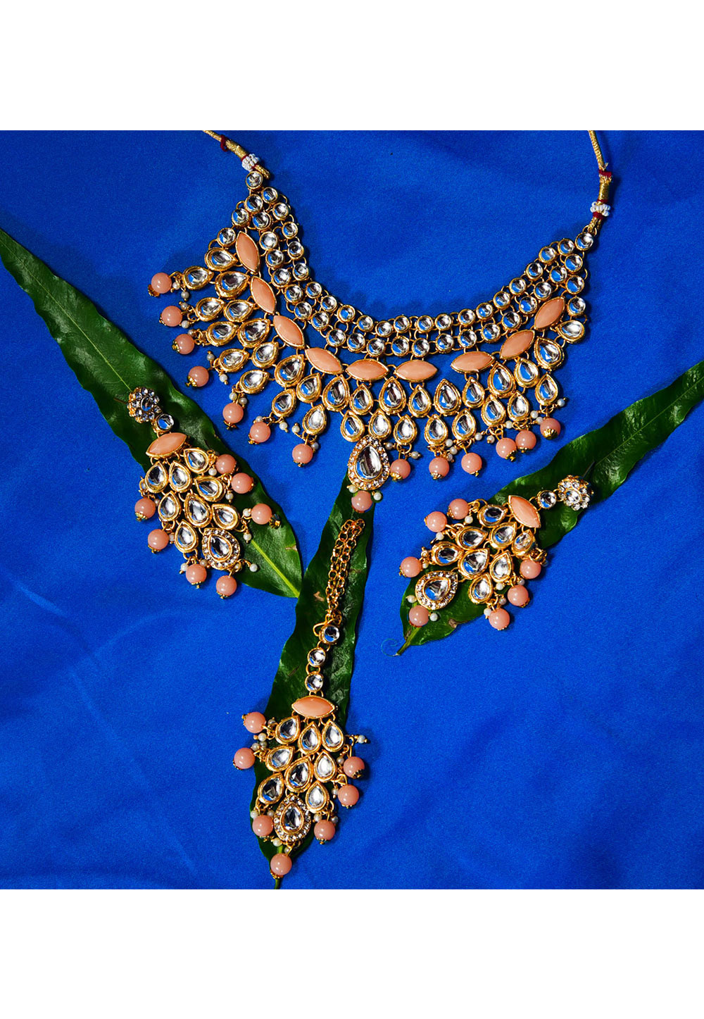 Peach Alloy Austrian Diamond Necklace Set With Earrings and Maang Tikka 247940