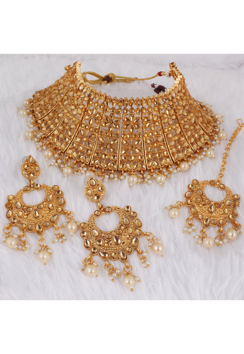 Golden Alloy Necklace Set With Earrings and Maang Tikka 257335