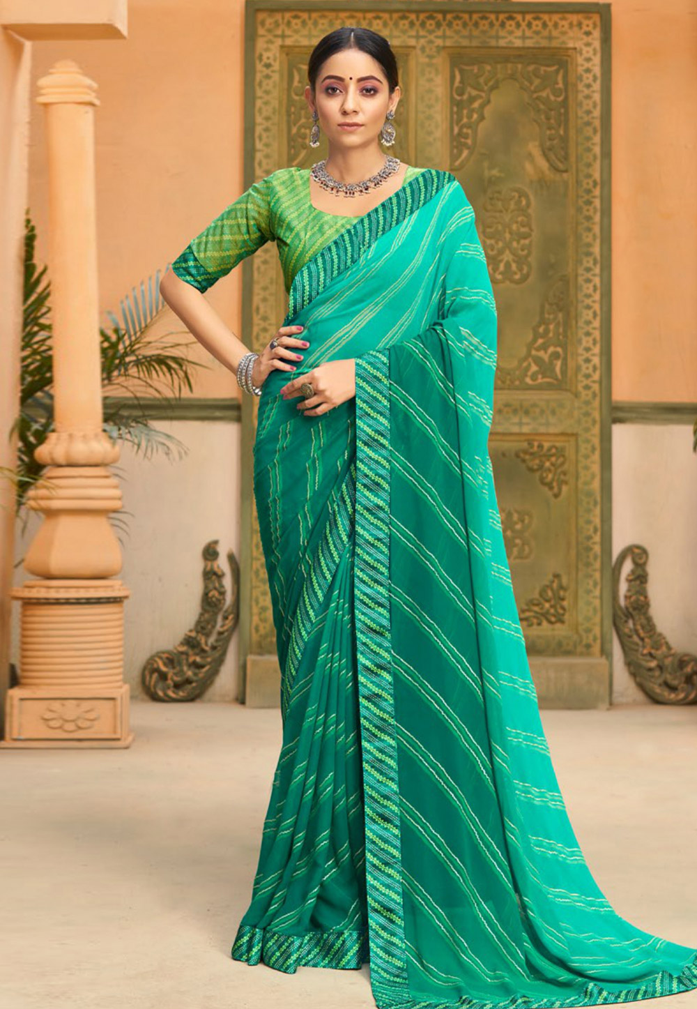 Sea Green Faux Georgette Saree With Blouse 245960