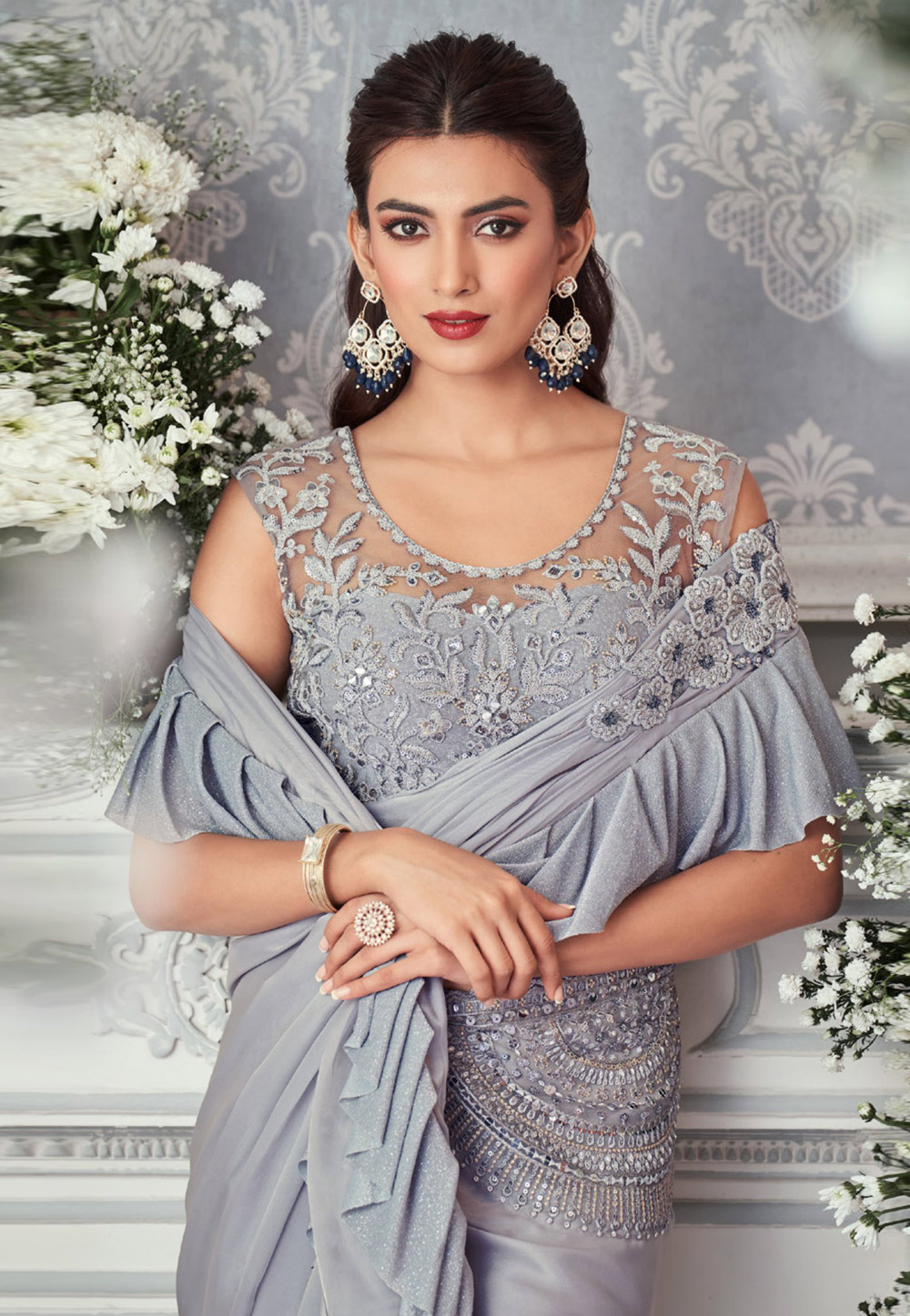 GREY RUFFLE SAREE ( Saree ) & PURPLE MAGIC ( Blouse ) If you've ever  doubted the allure of light-colored sarees for a wedding, let Monr... |  Instagram