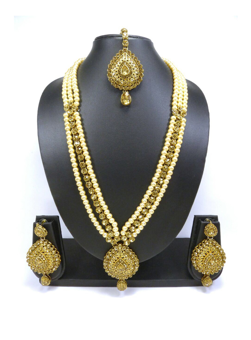 Golden Brass Kundan Set With Earrings and Maang Tikka 109127