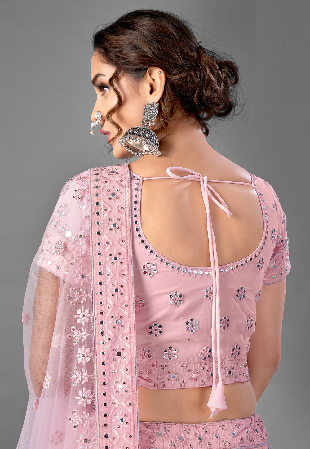 PETAL PINK TULLE HAND EMBROIDERED MIRROR WORK LEHENGA SET WITH A CUTWORK  BLOUSE PAIRED WITH A MATCHING DUPATTA AND SILVER EMBELLISHMENTS. - Seasons  India