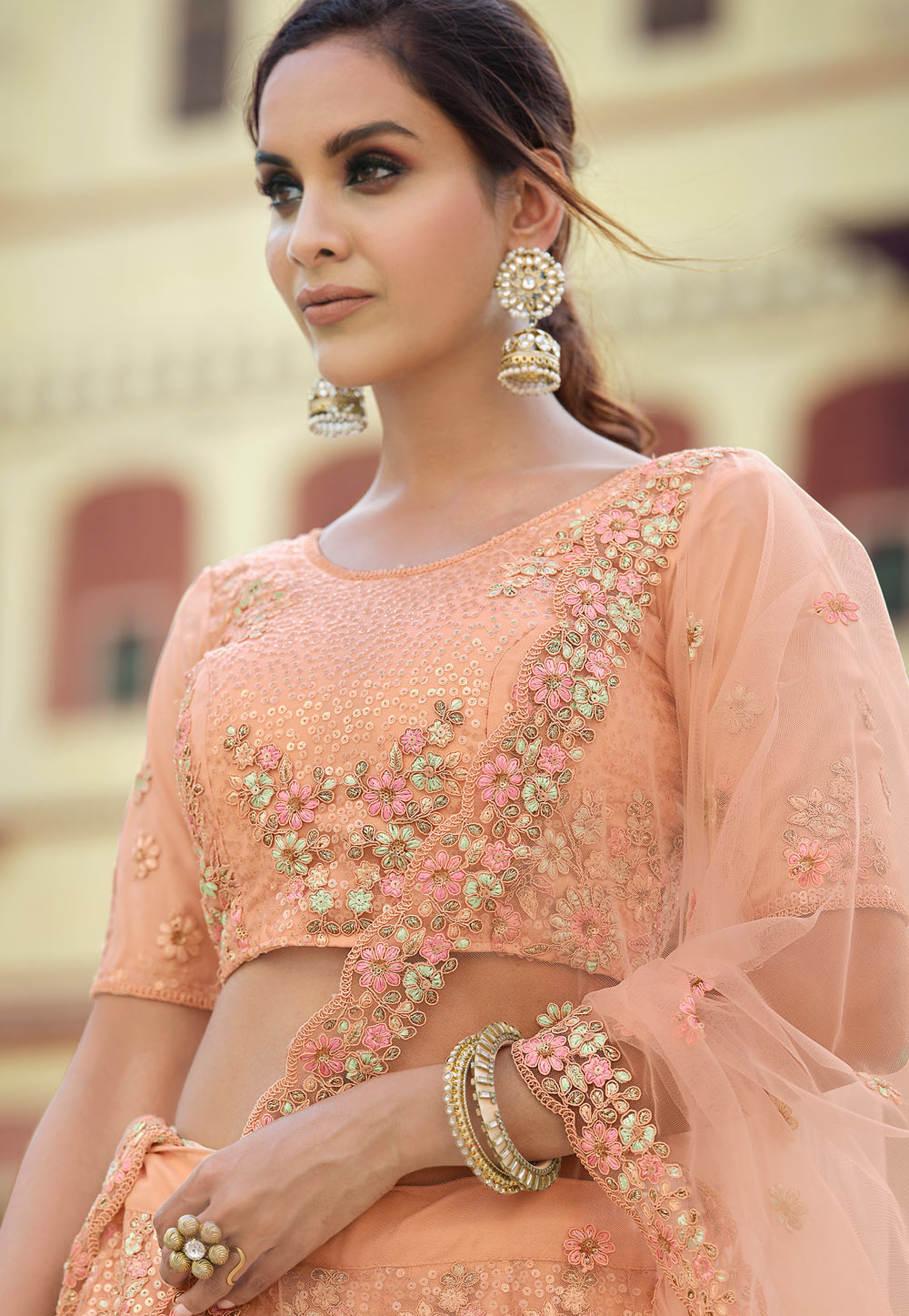 Sabyasachi Bride Wore A Minimalistic Peach-Hued Lehenga With A Pop Of  Emerald Green Jewellery