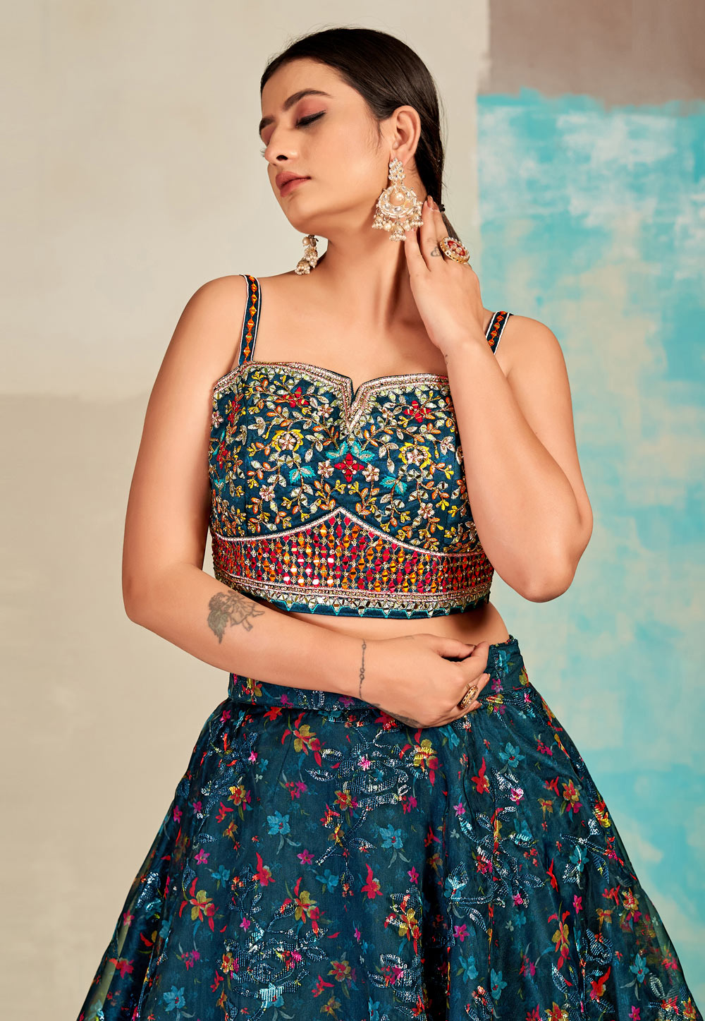 Ivory blouse, yellow floral lehenga – Sapana Amin