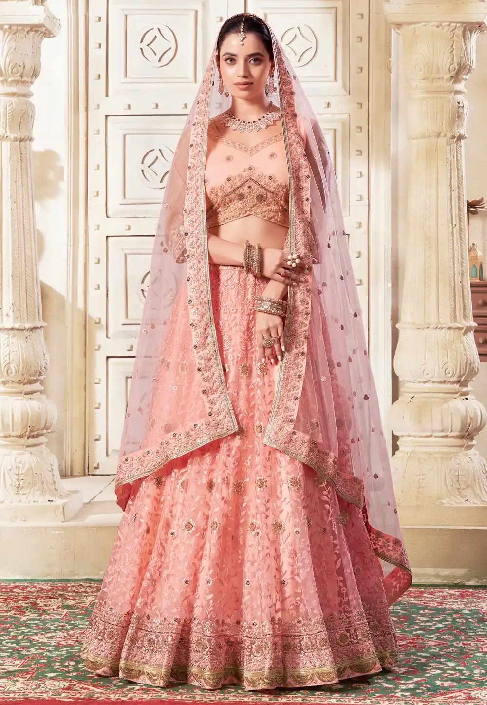 Peach Net Lehenga Choli 294451