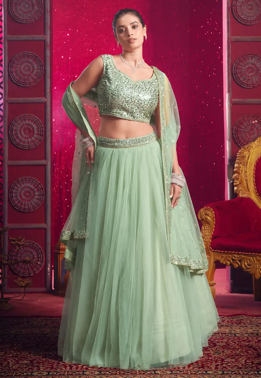 Pista Green Net A Line Lehenga Choli 293143