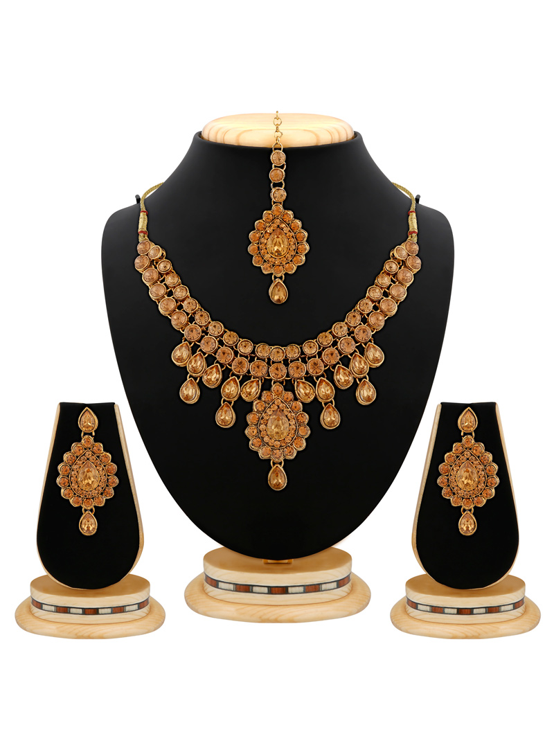 Golden Brass Kundan Set With Earrings and Maang Tikka  103936